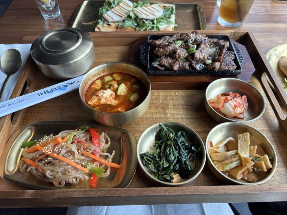 Japchae, kimchi jjigae, banchan and galbi